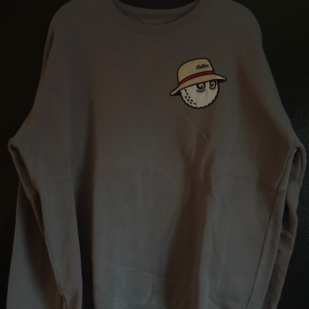 Stylish Gray Crewneck Sweater with Graphic